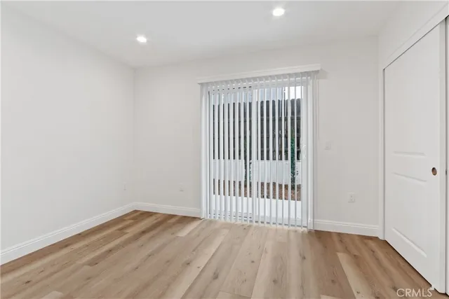 wooden floor in a hall with an entryway