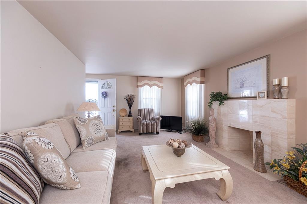 2511 McNeilly Road Pittsburgh, PA 15226 - Photo 5 of 23 a living room with furniture and a fireplace