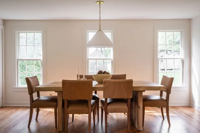 a big yard with lots of green space and trees