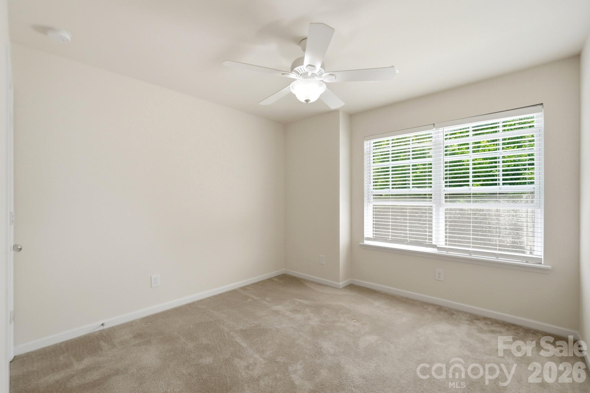 175 Limerick Road, Unit B Mooresville, NC 28115 - Photo 23 of 30 a view of an empty room with a window