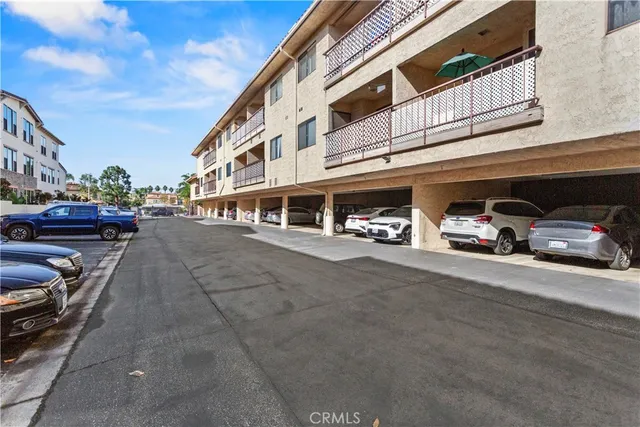 a view of the street with cars