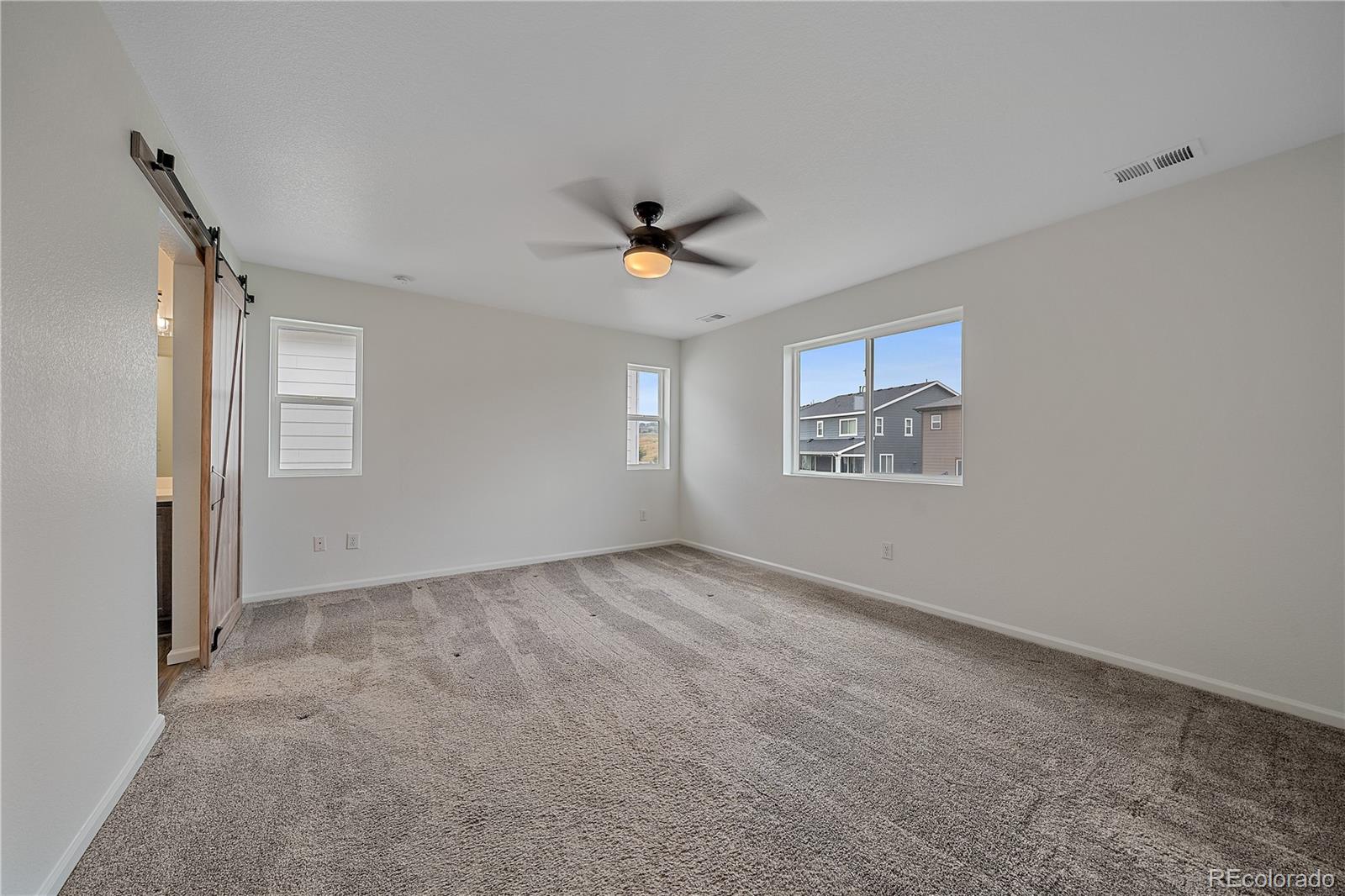 5465 Gray Wolf Lane Castle Rock, CO 80104 - Photo 14 of 21 a view of an empty room with a window