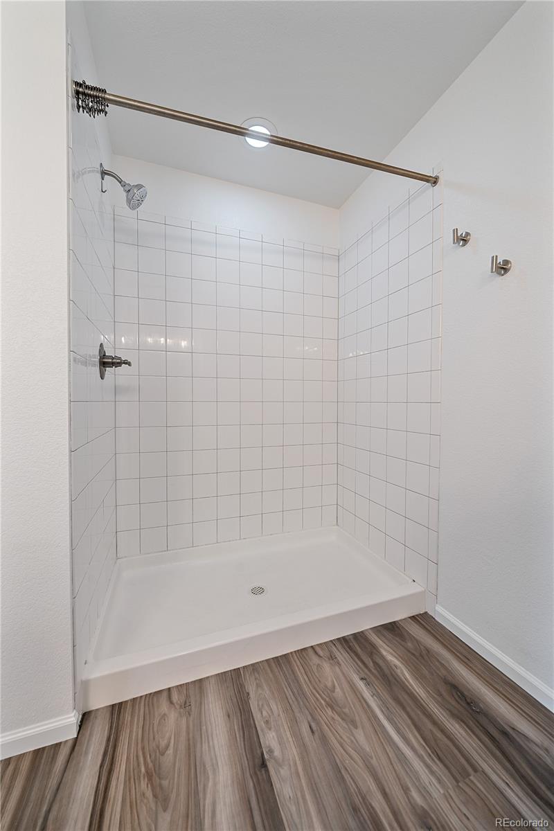 5465 Gray Wolf Lane Castle Rock, CO 80104 - Photo 16 of 21 a bathroom with a shower
