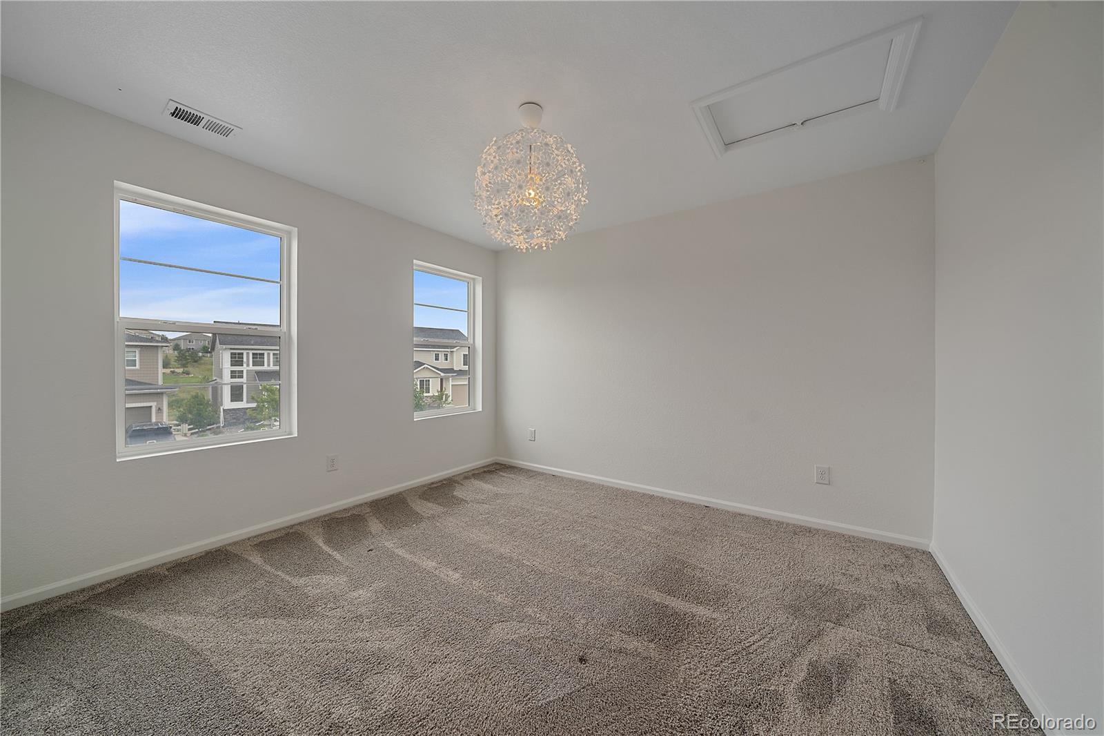 5465 Gray Wolf Lane Castle Rock, CO 80104 - Photo 18 of 21 a view of an empty room with a window