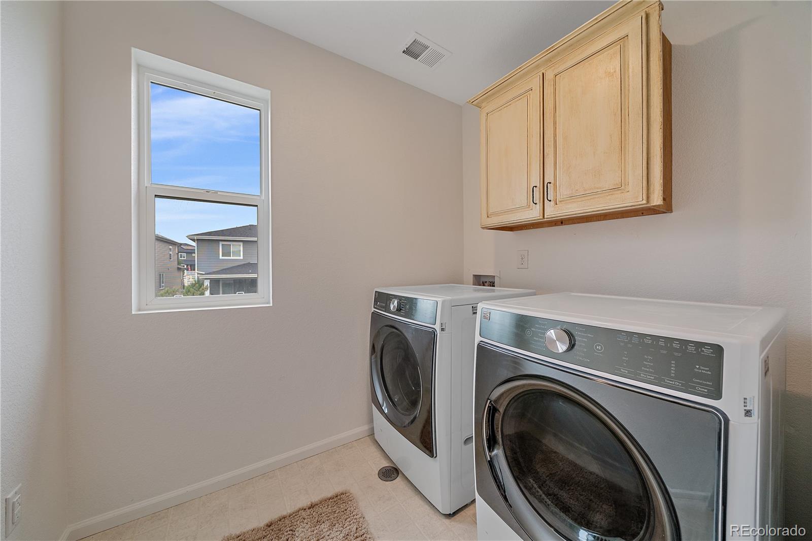 5465 Gray Wolf Lane Castle Rock, CO 80104 - Photo 20 of 21 a utility room with dryer and washer