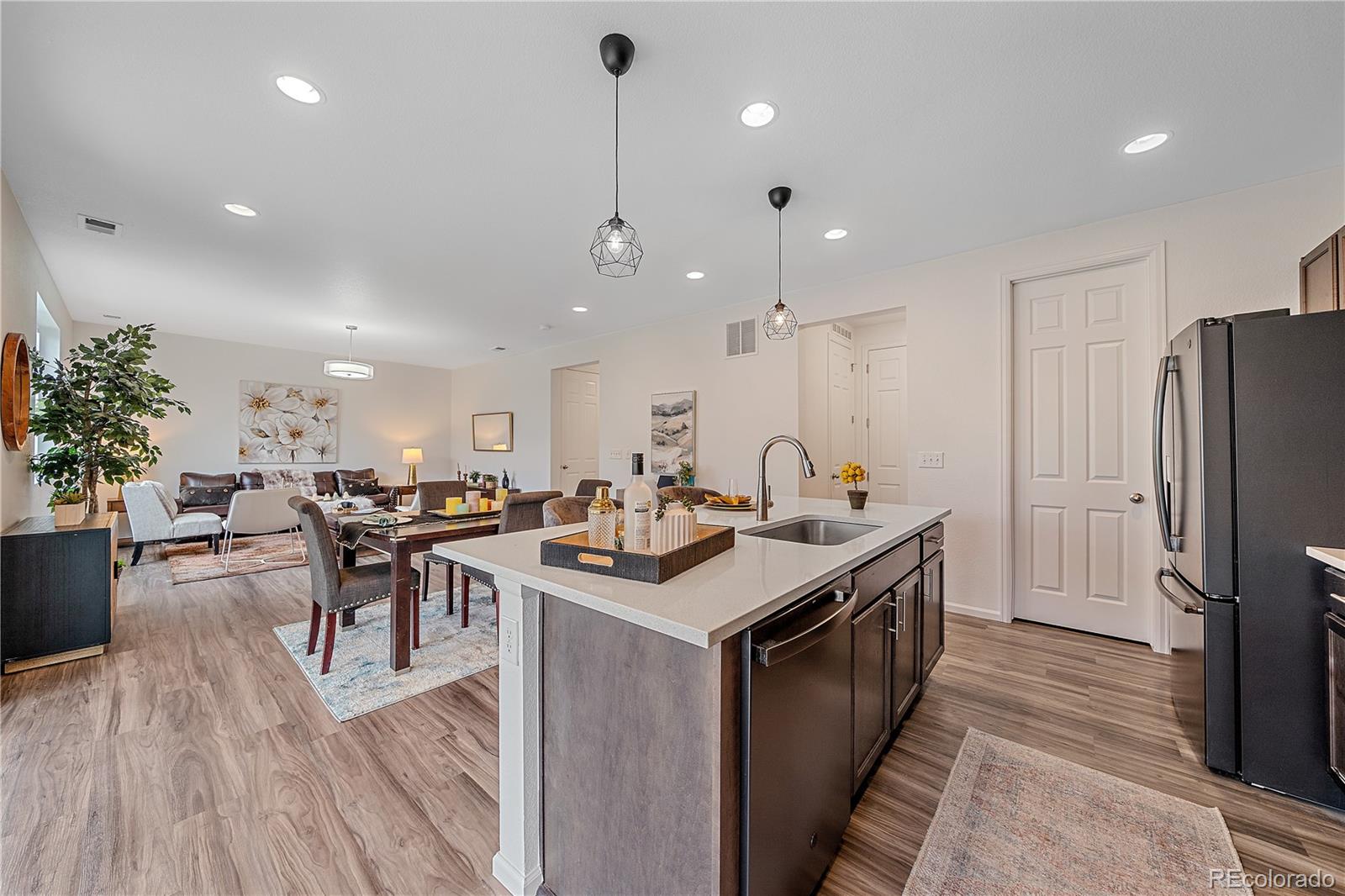 5465 Gray Wolf Lane Castle Rock, CO 80104 - Photo 9 of 21 a kitchen with counter space sink appliances and cabinets