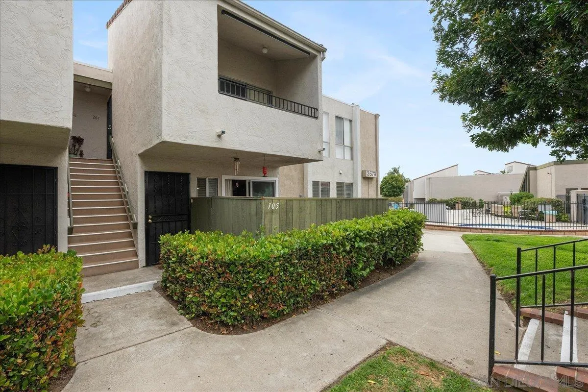 3579 Ruffin Road, Unit 105 San Diego, CA 92123 - Photo 16 of 23 a front view of a house with garden