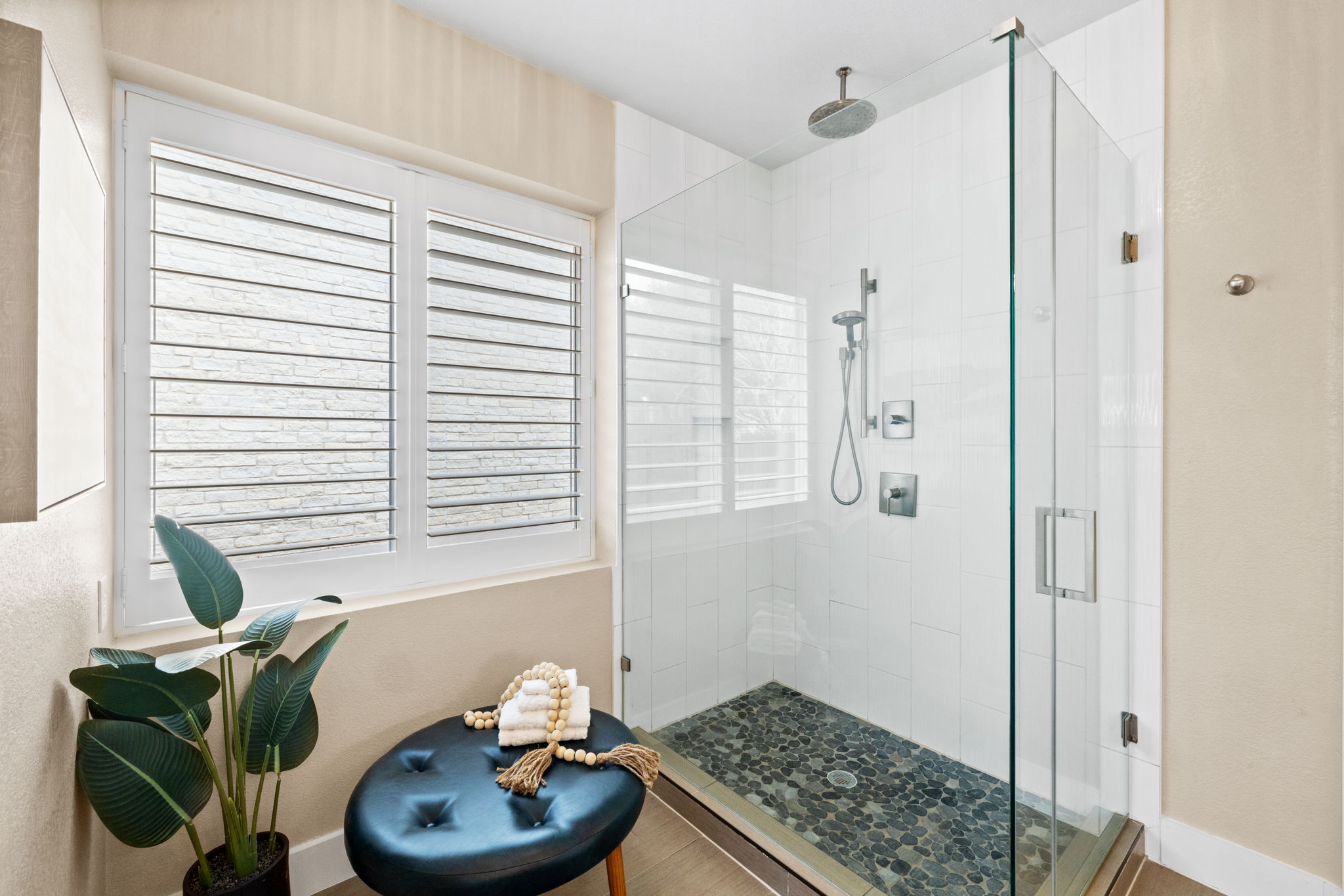 8112 Cobblestone Austin, TX 78735 - Photo 24 of 33 Bathroom featuring a shower stall and plenty of natural light