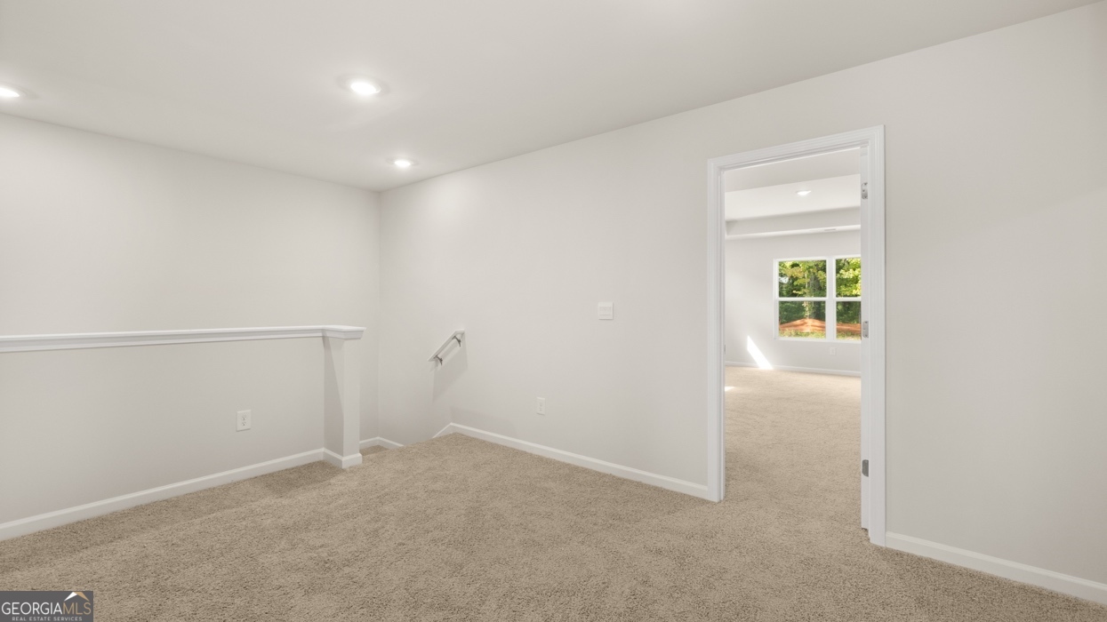 918 Stow Lane Monroe, GA 30655 - Photo 22 of 43 an empty room with windows