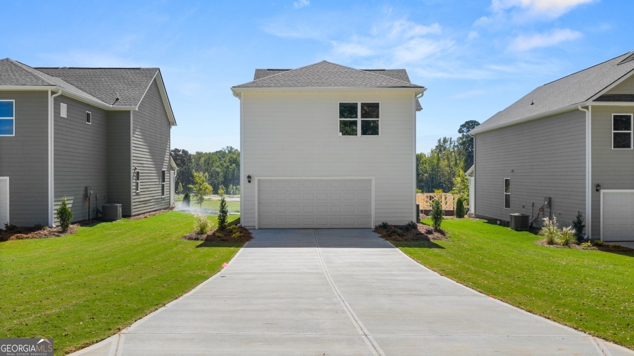 918 Stow Lane Monroe, GA 30655 - Photo 3 of 43 a front view of house with yard and green space