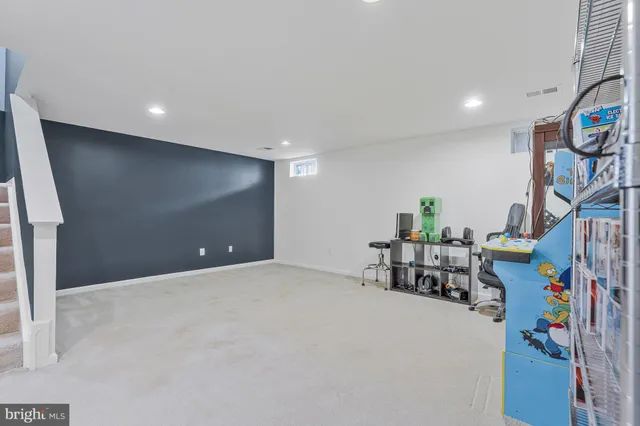 a room with furniture and a gym equipment