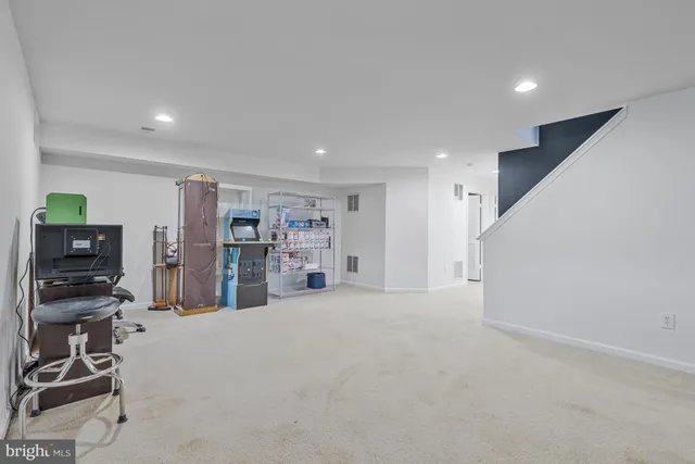a view of a livingroom with furniture and storage