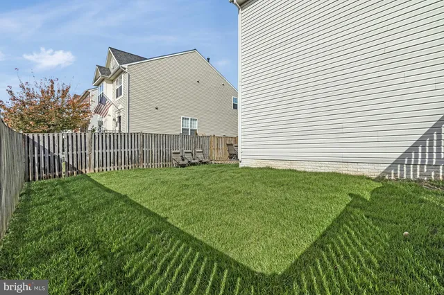 a view of a trees in front of a house