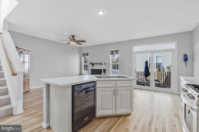 a kitchen with a stove and cabinets