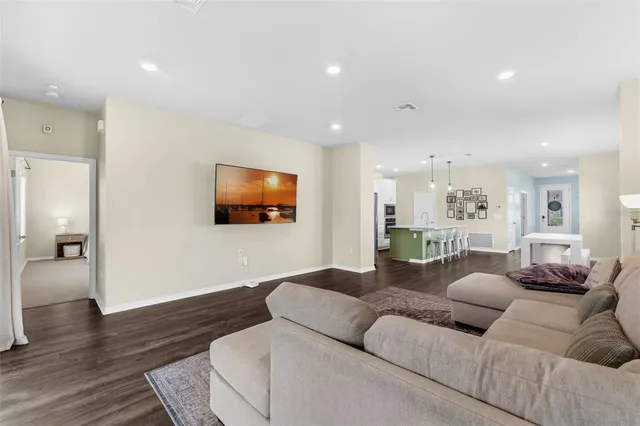 a view of a big yard with large trees