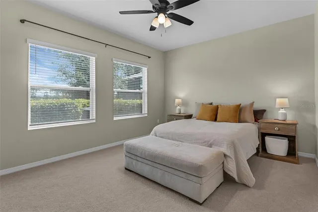 an aerial view of a house with a garden and a yard