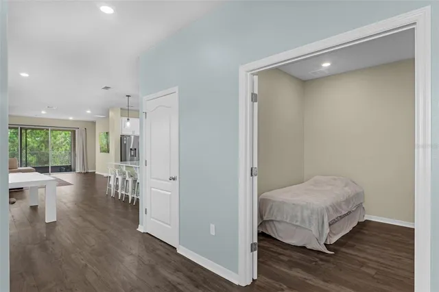an aerial view of residential houses with outdoor space and garden
