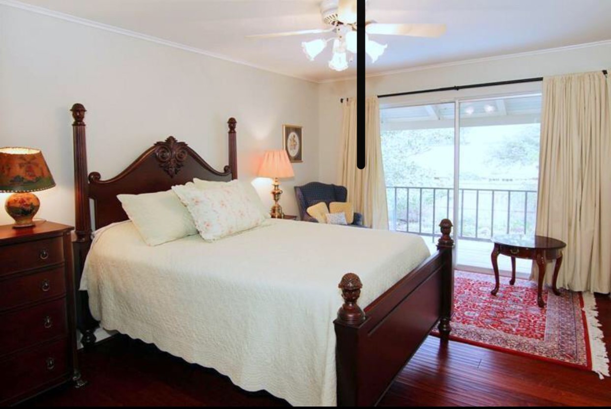 11910 Steppingstone Lane Houston, TX 77024 - Photo 8 of 14 a bed room with a bed and a large window