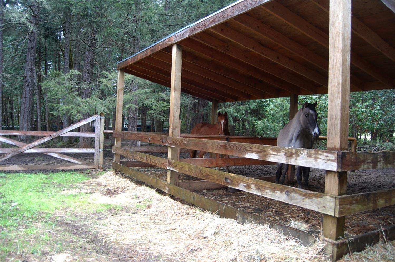 310 Page Creek Road Cave Junction, OR 97523 - Photo 20 of 31 Covered horse stalls