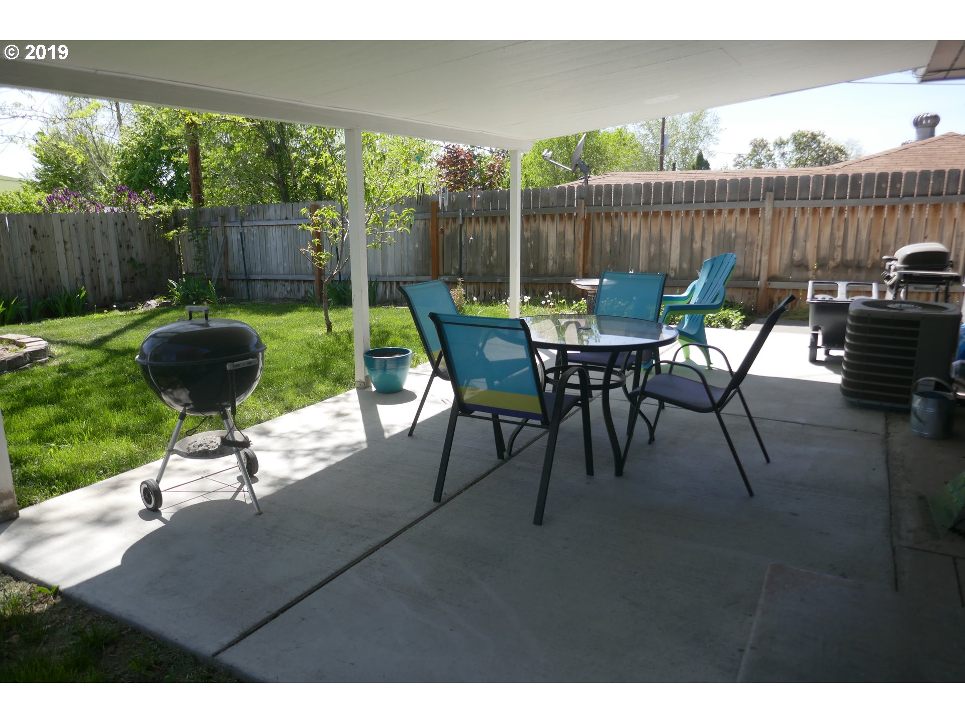 2402 Southwest Olson Avenue Pendleton, OR 97801 - Photo 18 of 26 a view of a chairs and tables in the back yard