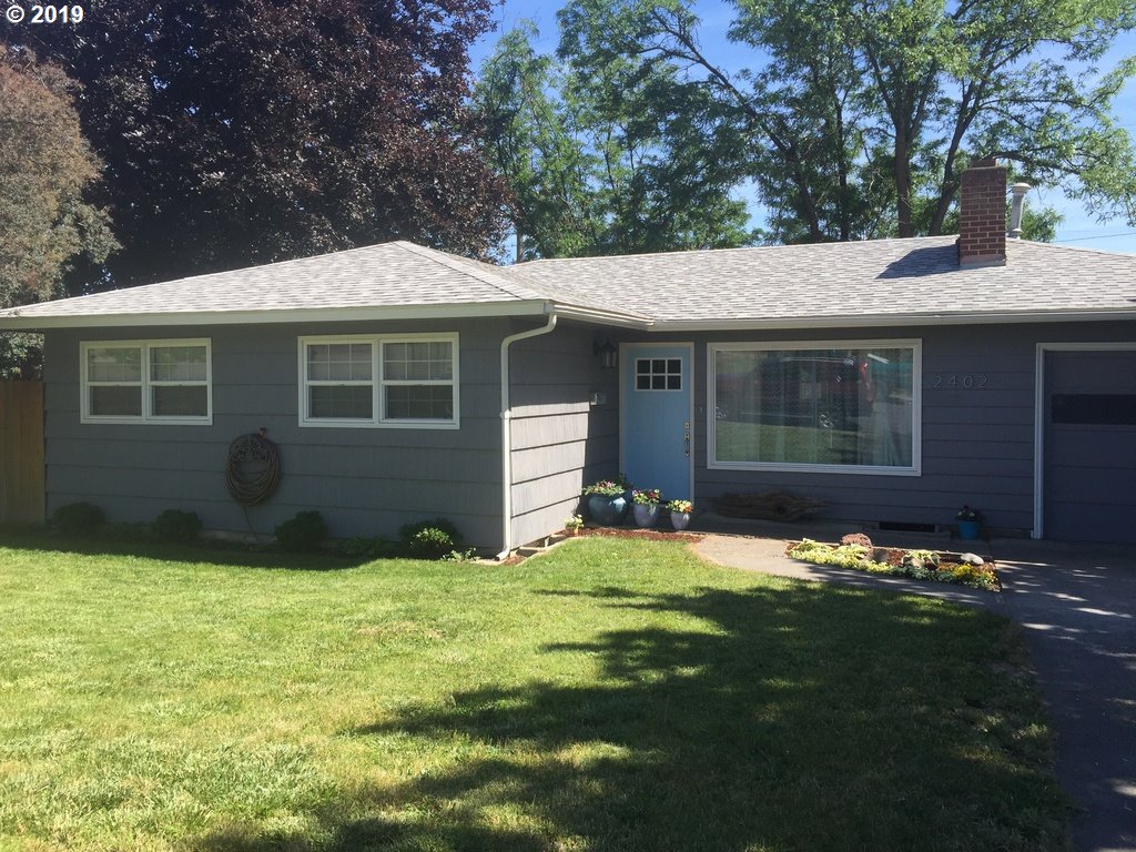 2402 Southwest Olson Avenue Pendleton, OR 97801 - Photo 3 of 26 a view of front of house with a yard