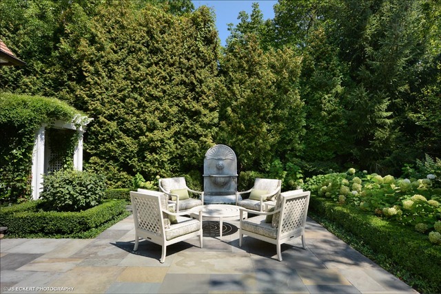 1363 Elm Tree Road Lake Forest, IL 60045 - Photo 23 of 24 a view of a table and chairs in the patio