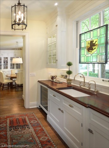 1363 Elm Tree Road Lake Forest, IL 60045 - Photo 5 of 24 a bathroom with double vanity sink and a mirror