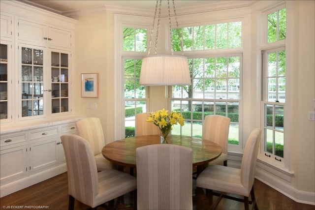 1363 Elm Tree Road Lake Forest, IL 60045 - Photo 7 of 24 a dining room with furniture a chandelier and wooden floor