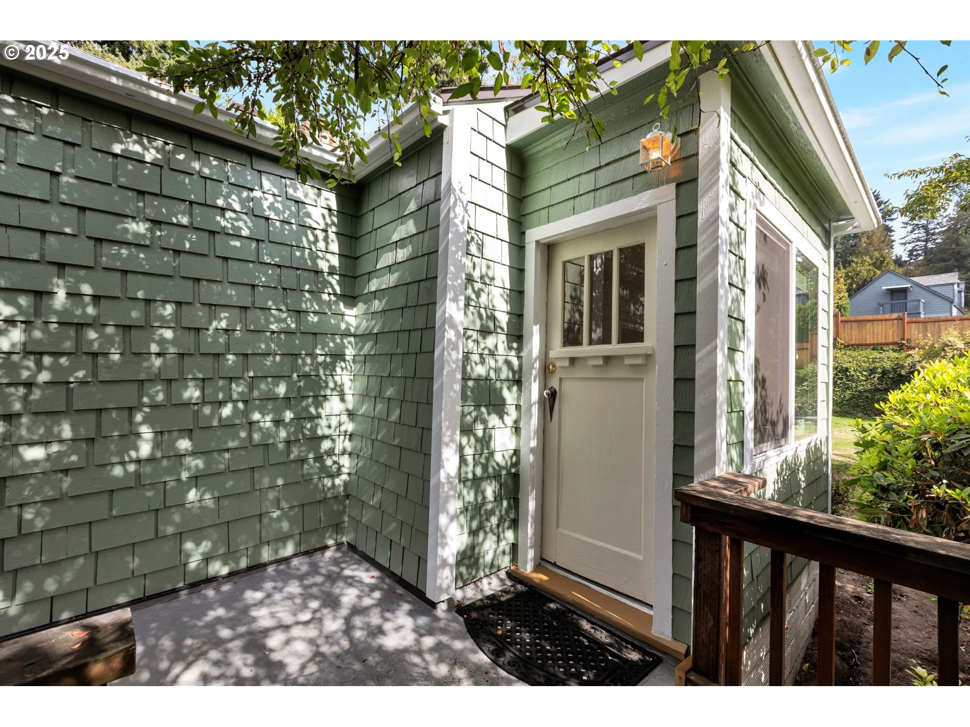 9224 Southwest 26th Avenue Portland, OR 97219 - Photo 24 of 30 a view of a porch with a porch