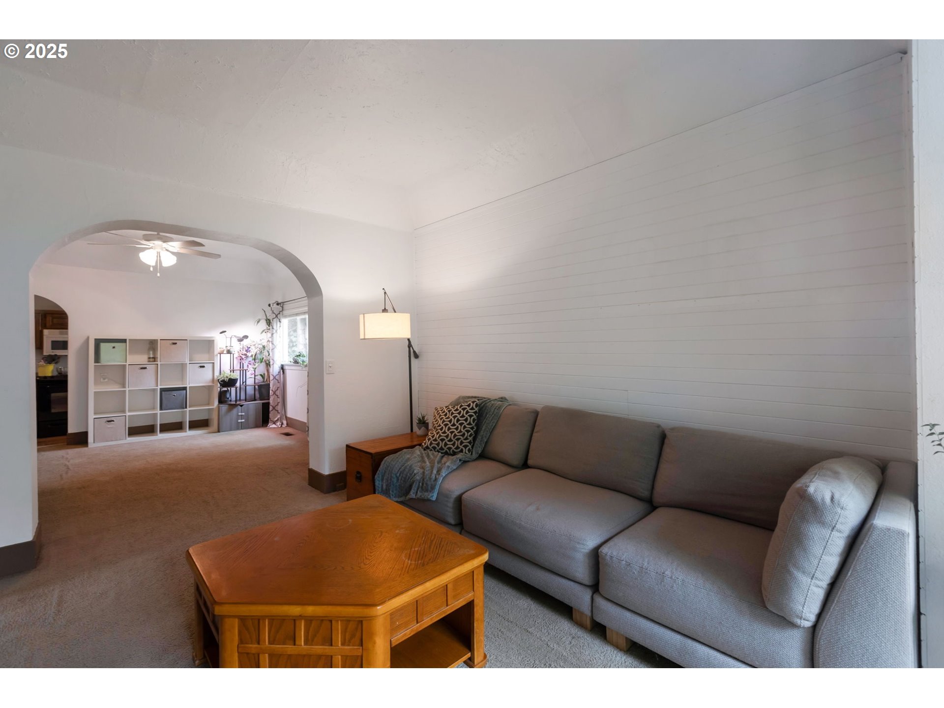 9224 Southwest 26th Avenue Portland, OR 97219 - Photo 6 of 30 a living room with furniture and kitchen view