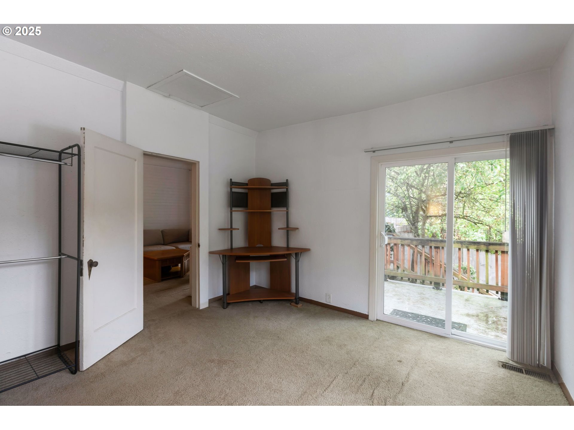 9224 Southwest 26th Avenue Portland, OR 97219 - Photo 9 of 30 a kitchen with refrigerator and window