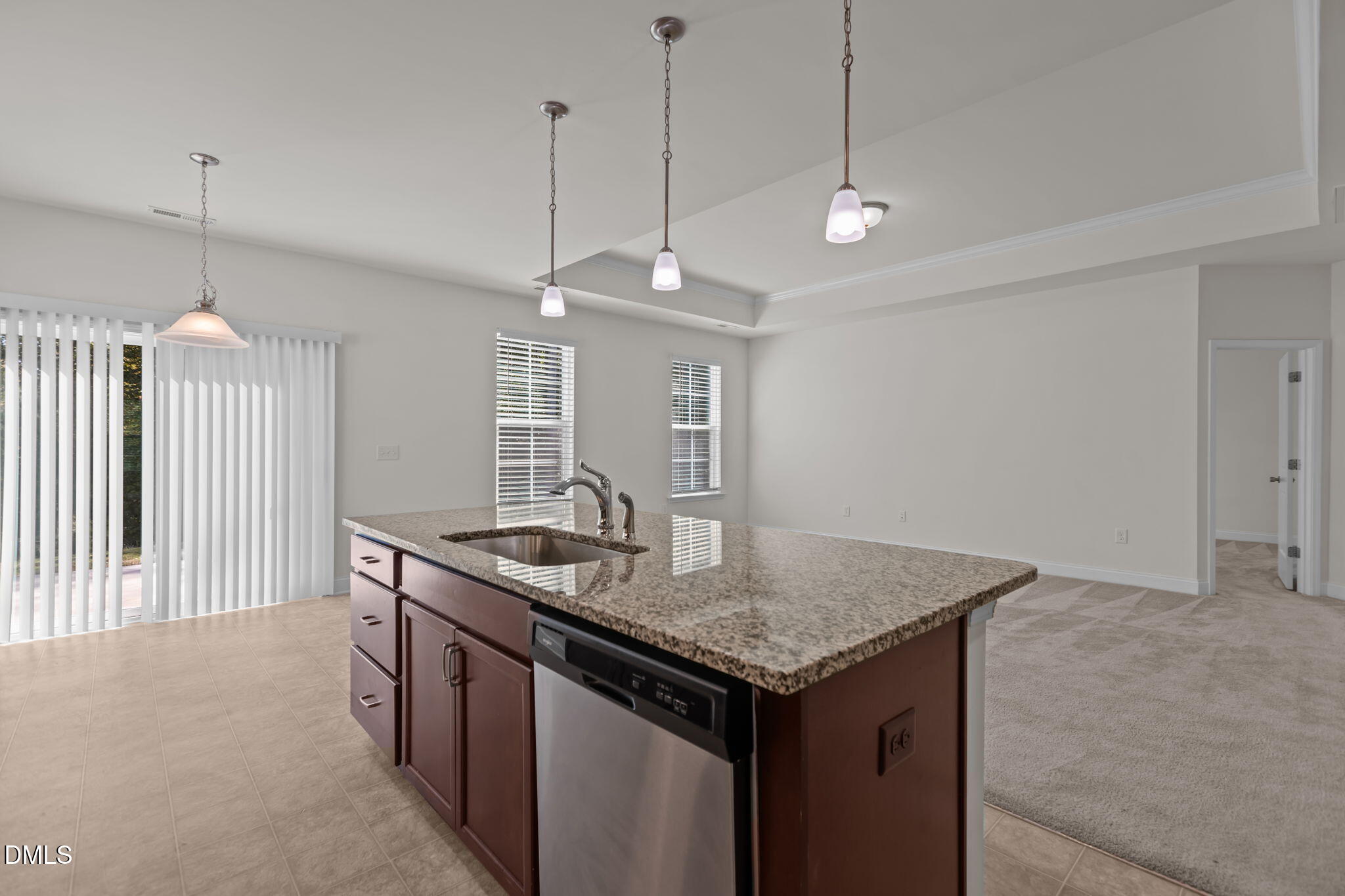 354 Dando Street Garner, NC 27529 - Photo 11 of 61 a kitchen with a counter space wooden floor and appliances