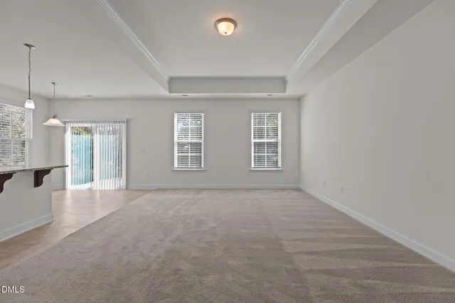 a large kitchen with stainless steel appliances granite countertop a large counter top and a stove