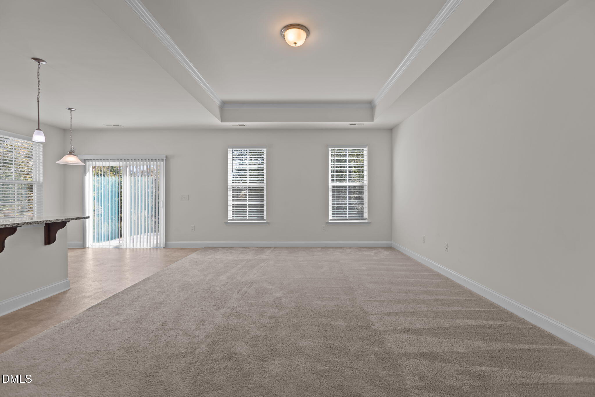 354 Dando Street Garner, NC 27529 - Photo 17 of 61 a view of an empty room with a window