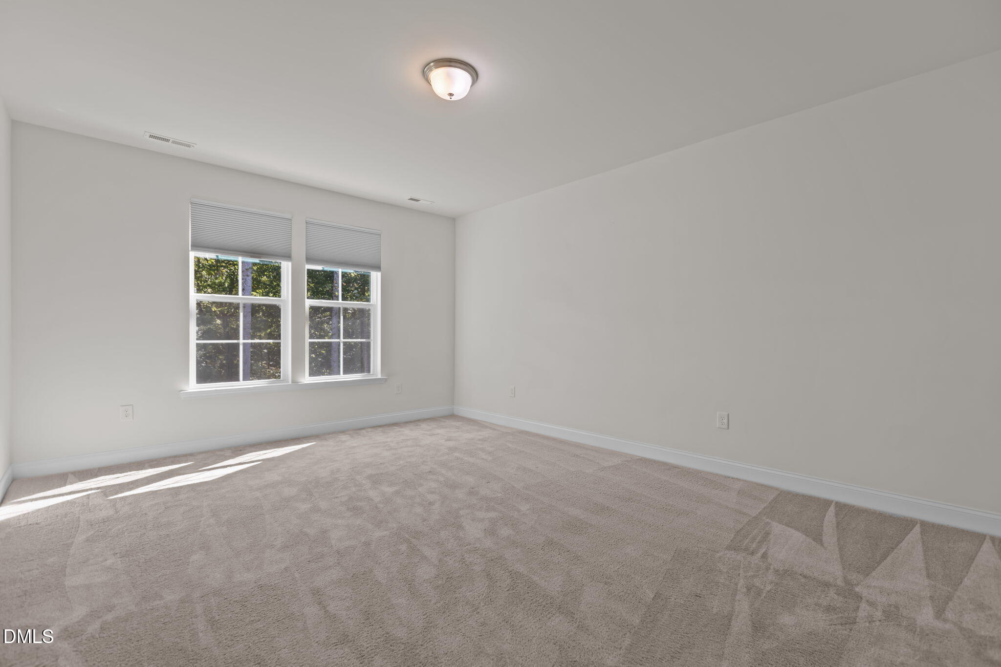 354 Dando Street Garner, NC 27529 - Photo 19 of 61 an empty room with a window