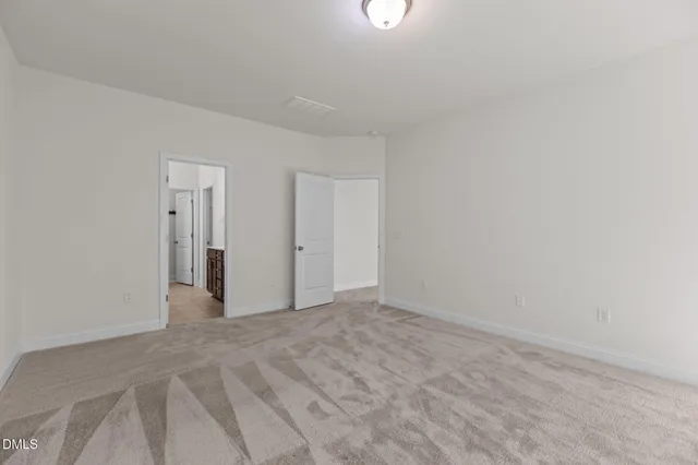 a bathroom with a sink double vanity and a mirror