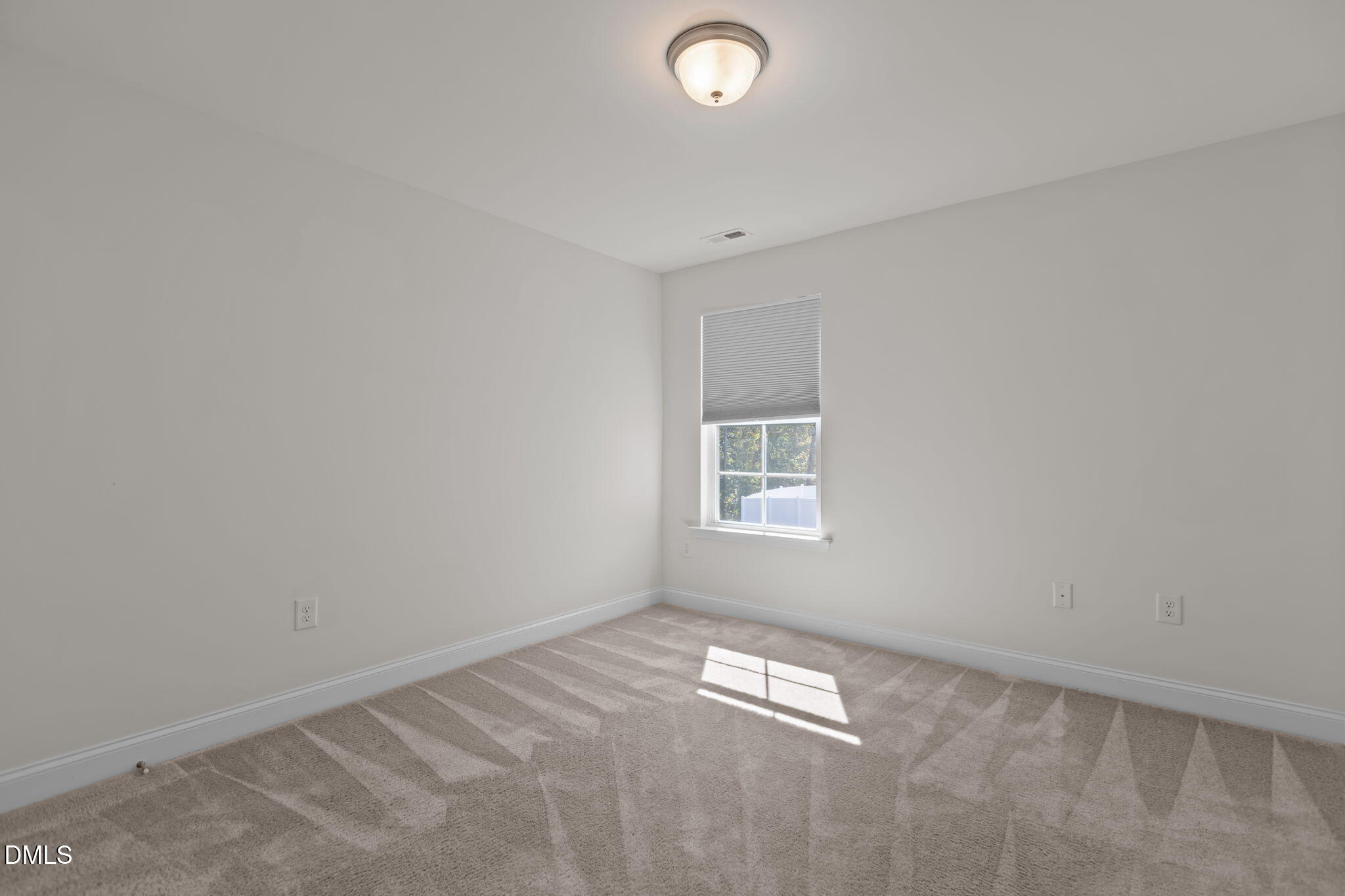 354 Dando Street Garner, NC 27529 - Photo 28 of 61 an empty room with a window