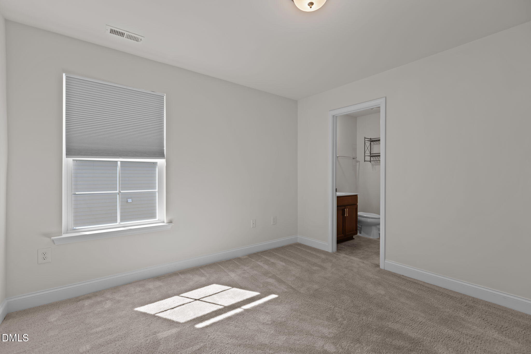 354 Dando Street Garner, NC 27529 - Photo 29 of 61 an empty room with windows
