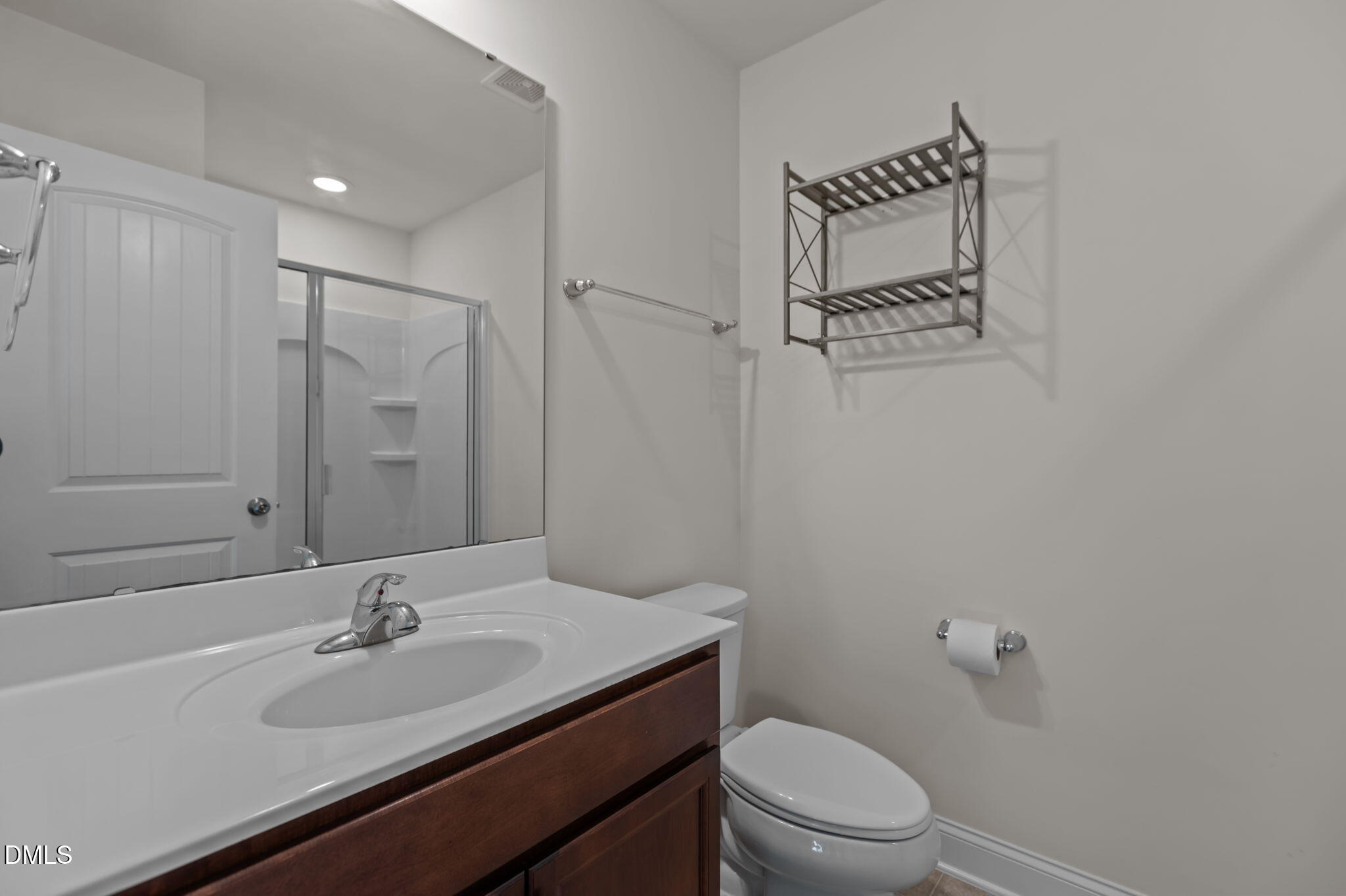 354 Dando Street Garner, NC 27529 - Photo 30 of 61 a bathroom with a sink toilet and shower