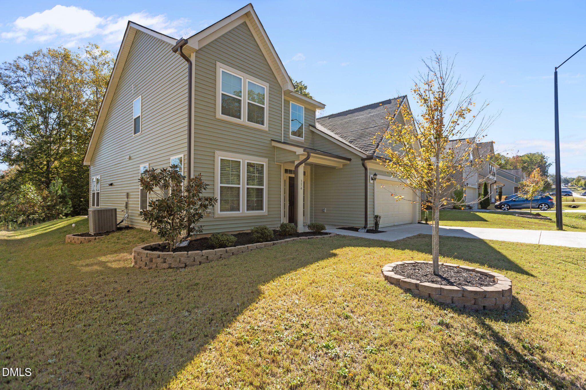 354 Dando Street Garner, NC 27529 - Photo 3 of 61 a house with swimming pool in front of it