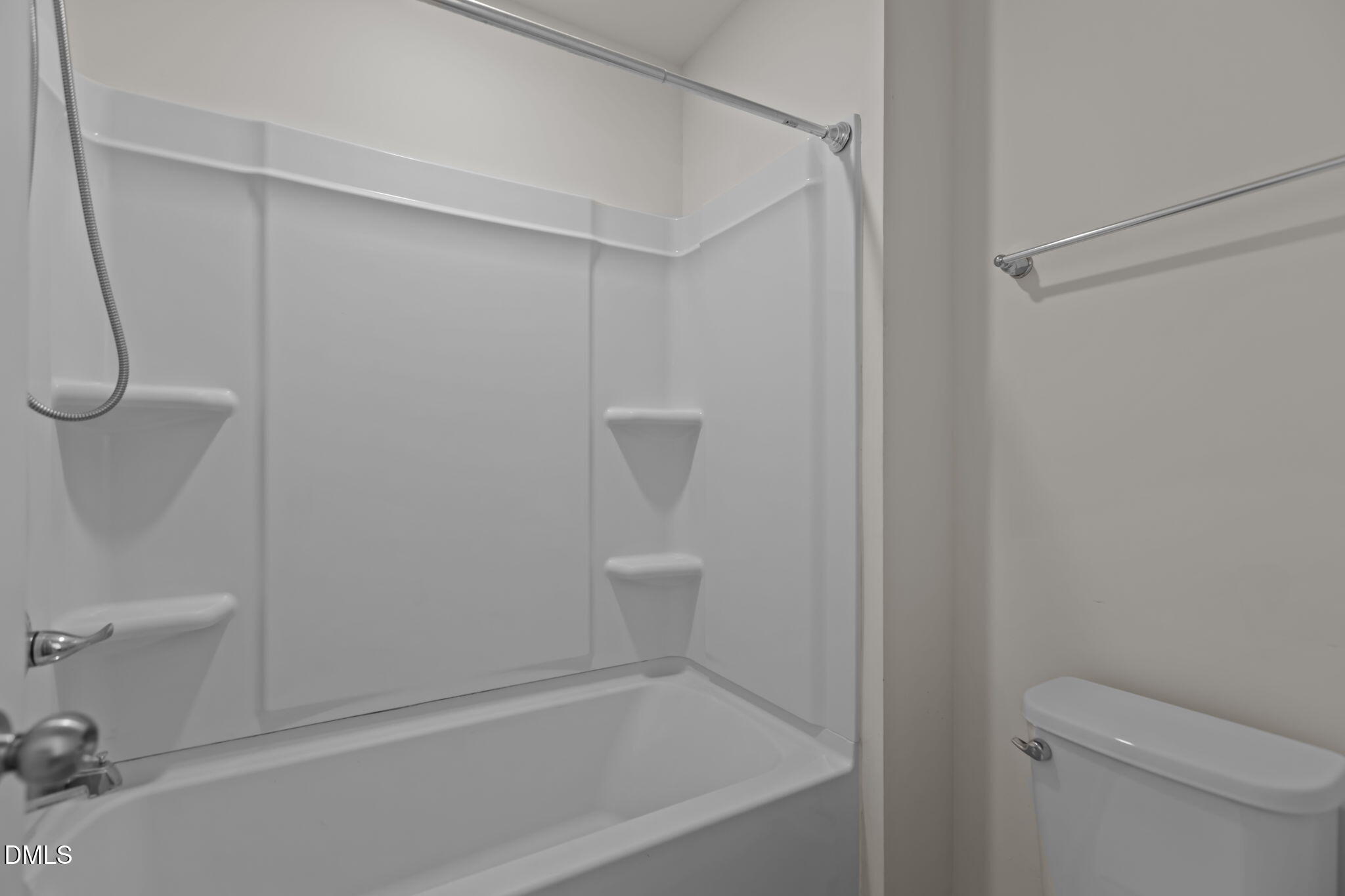 354 Dando Street Garner, NC 27529 - Photo 34 of 61 a bathroom with a shower and a toilet