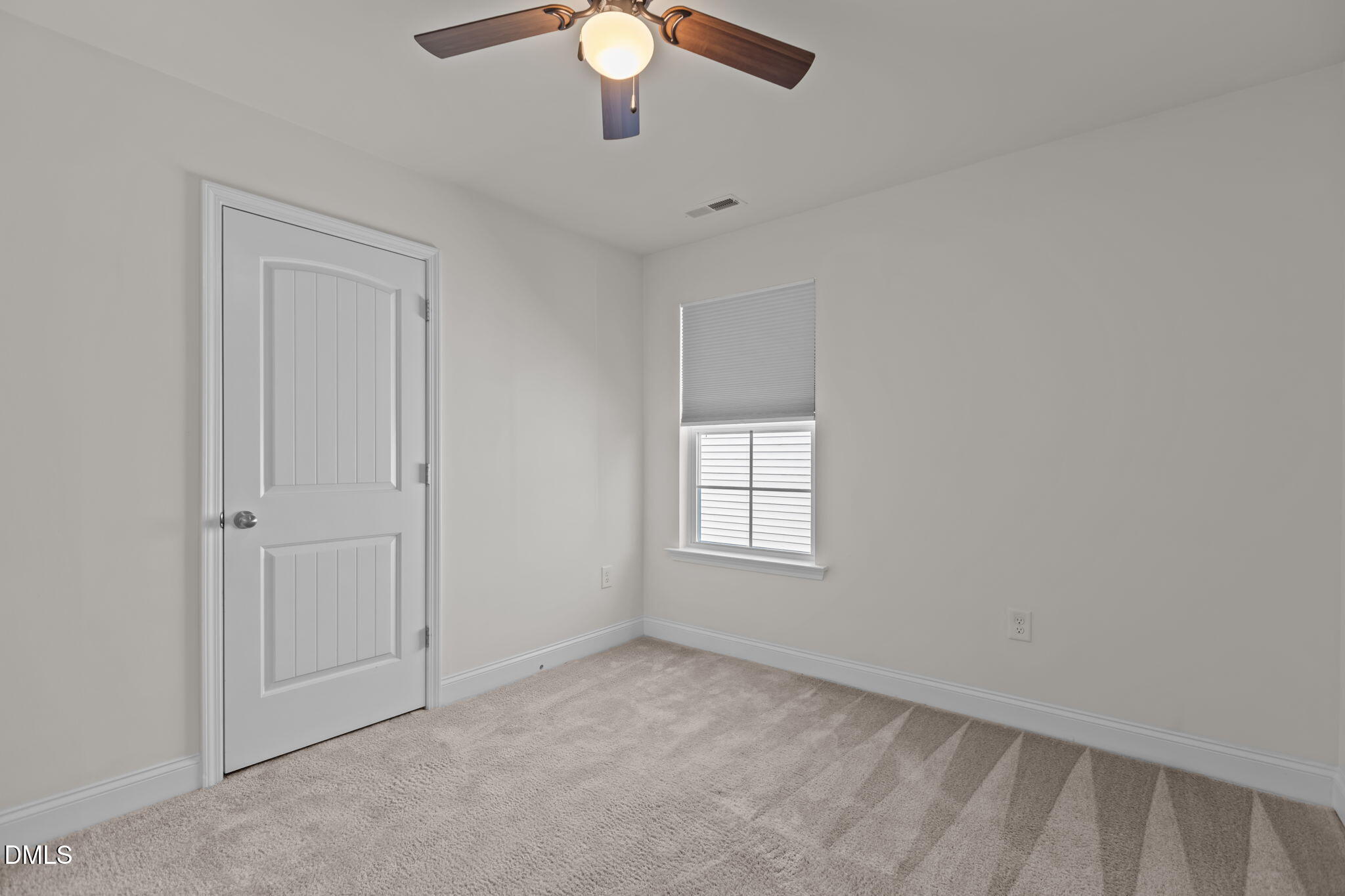 354 Dando Street Garner, NC 27529 - Photo 35 of 61 an empty room with chandelier fan
