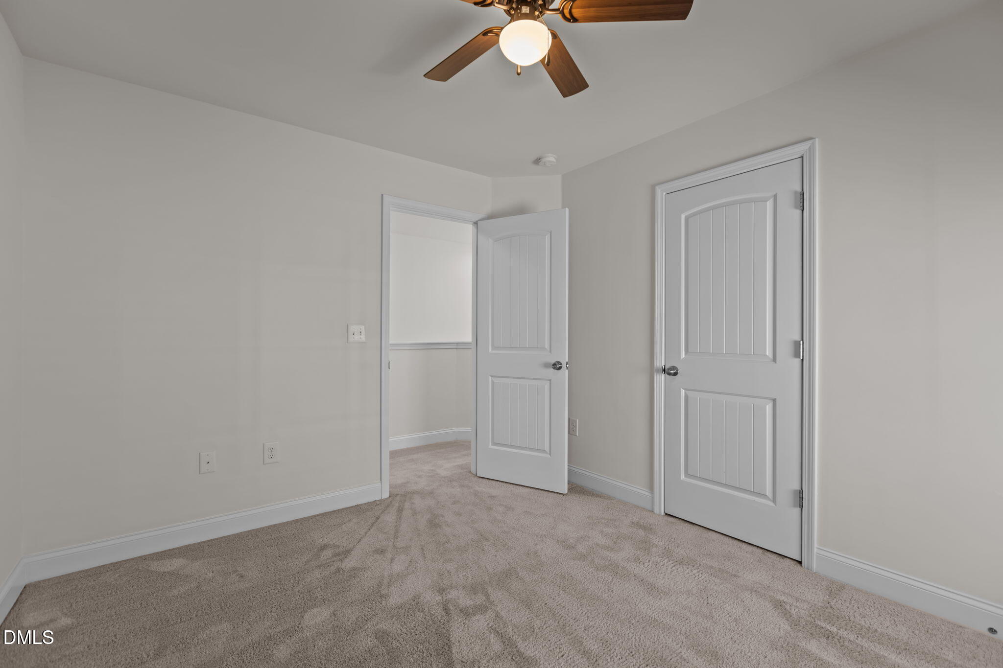 354 Dando Street Garner, NC 27529 - Photo 36 of 61 a view of an empty room and chandelier fan