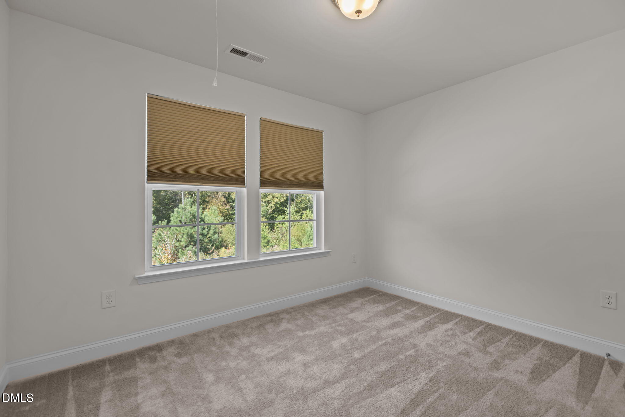 354 Dando Street Garner, NC 27529 - Photo 37 of 61 an empty room with a window