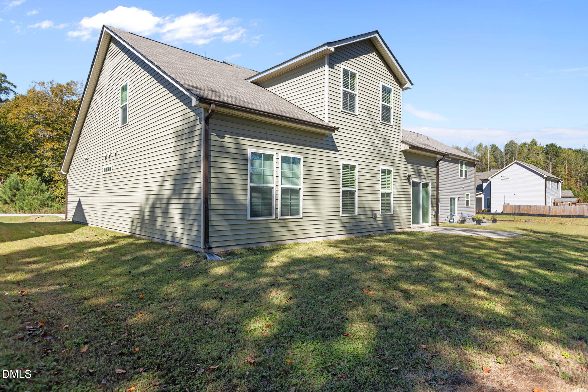 354 Dando Street Garner, NC 27529 - Photo 40 of 61 a view of a house with a yard and garage