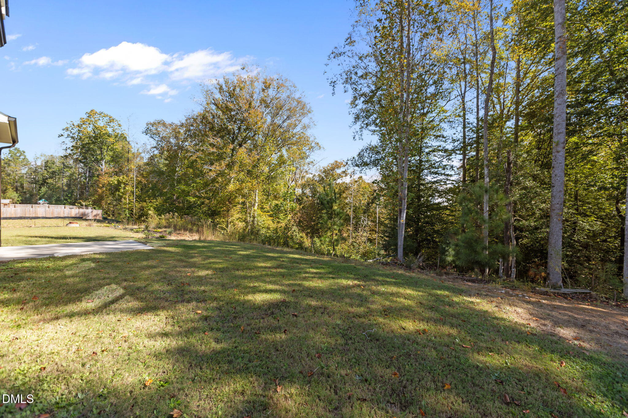 354 Dando Street Garner, NC 27529 - Photo 41 of 61 a view of outdoor space with trees all around
