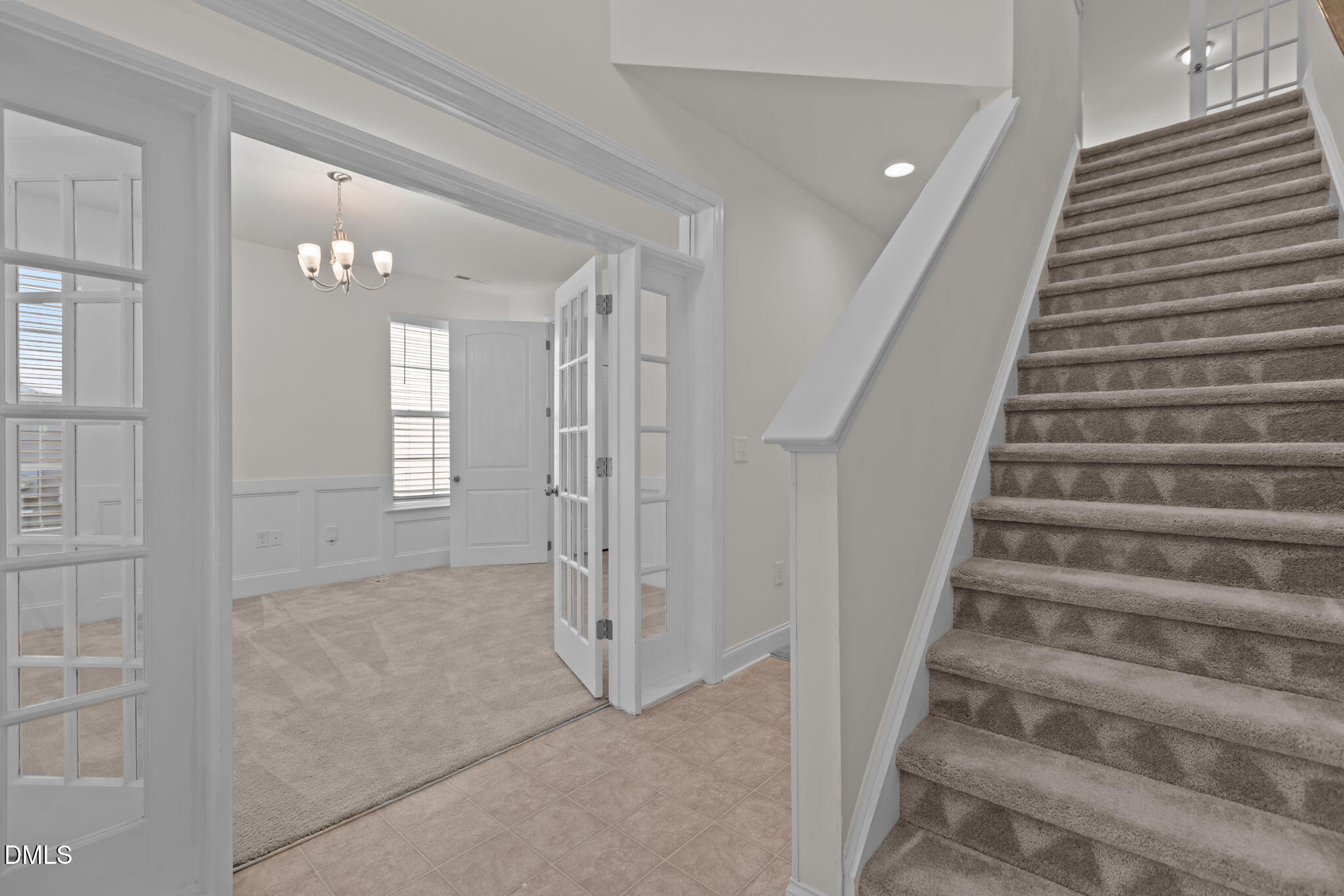 354 Dando Street Garner, NC 27529 - Photo 6 of 61 a view of an entryway with staircase