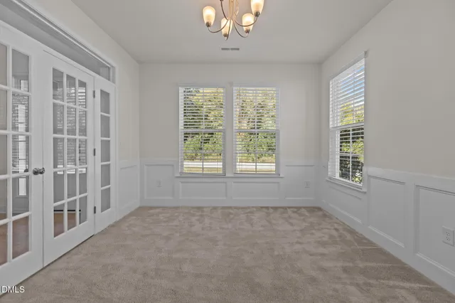 a view of hallway with closet