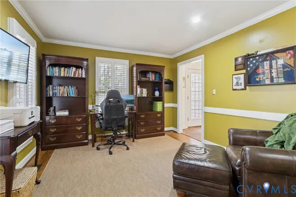 a bedroom with a workspace