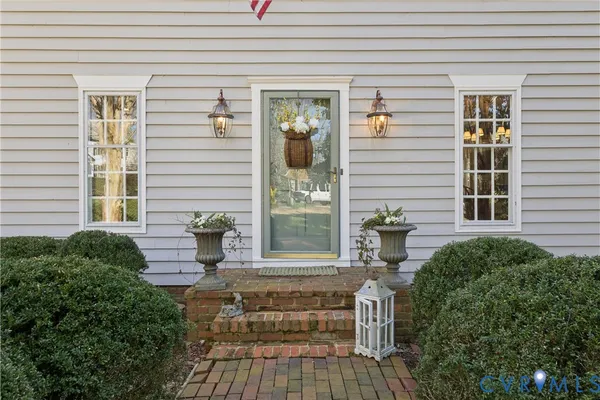 a front view of a house with a porch